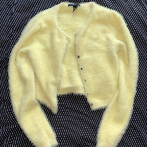 fuzzy yellow cardigan